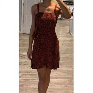 Burnt Orange Cheetah print wrap dress